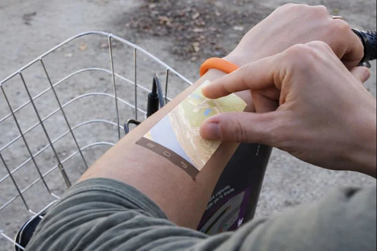 Cicret Bracelet wearable device with a sleek band and touchscreen projection on skin for interactive control and notifications.